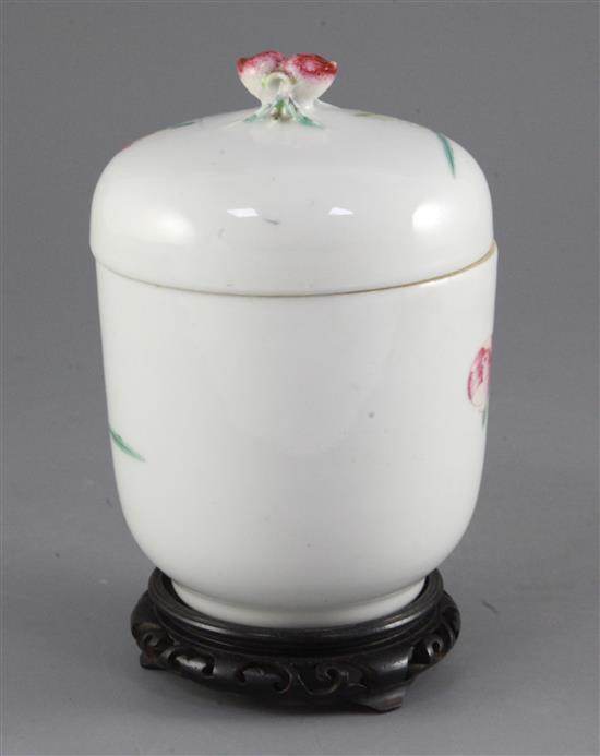 A Chinese famille rose jar and cover, Guangxu six character mark and of the period (1875-1908), height 15cm, wood stand